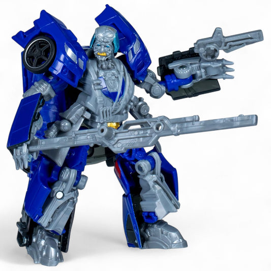 Transformers Studio Series Deluxe Class Transformers: Dark of the Moon Wheeljack Que