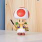 Nintendo The Super Mario Bros. Movie Toad Figure & Frying Pan