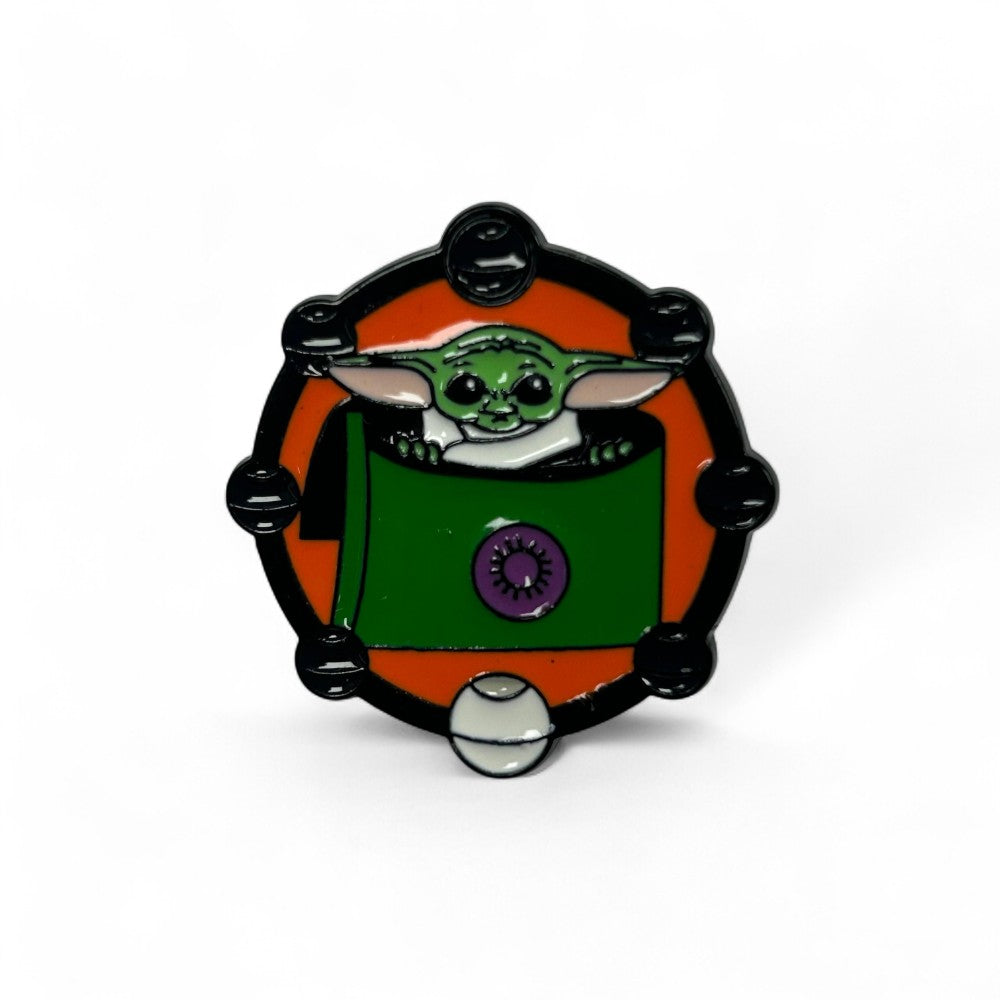 Pin Grogu en Tranportador
