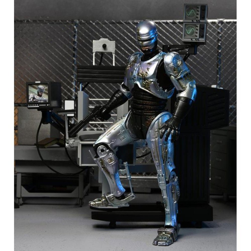 Ultimate Battle Damaged RoboCop con Silla